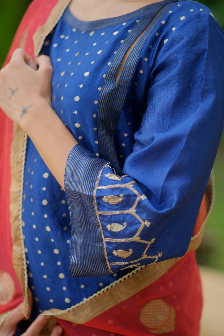 Brocade kurta W temple handwork on sleeve W contrast dupatta & matching pants