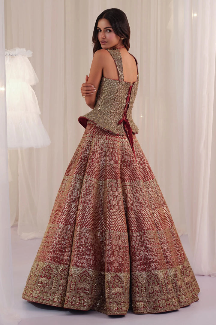 Maroon Raw Silk Lehenga With Peplum Sculpt Corset & Dupatta