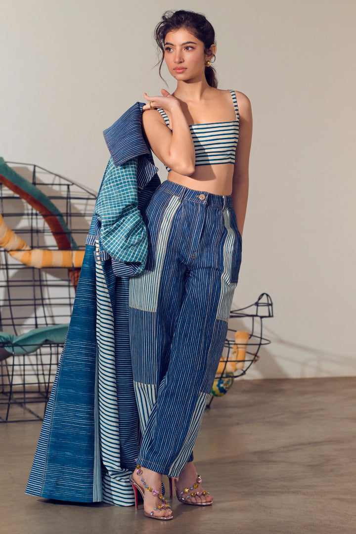 Sara Arjun in Selah Trench, Joyce Bustier & Jax Jeans
