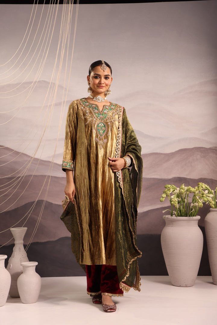 gold velvet kurta with green & maroon detailing and maroon velvet pant