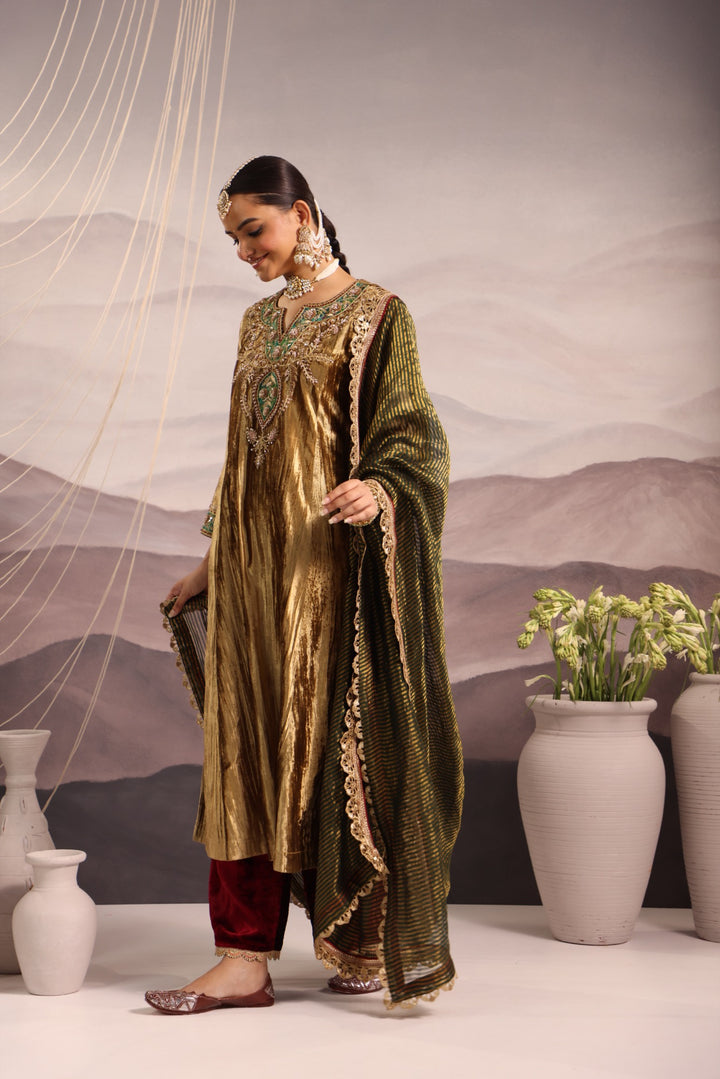 gold velvet kurta with green & maroon detailing and maroon velvet pant