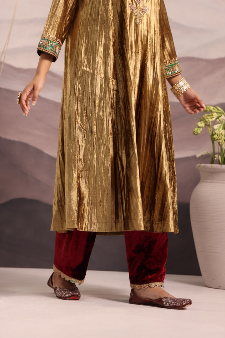 gold velvet kurta with green & maroon detailing and maroon velvet pant