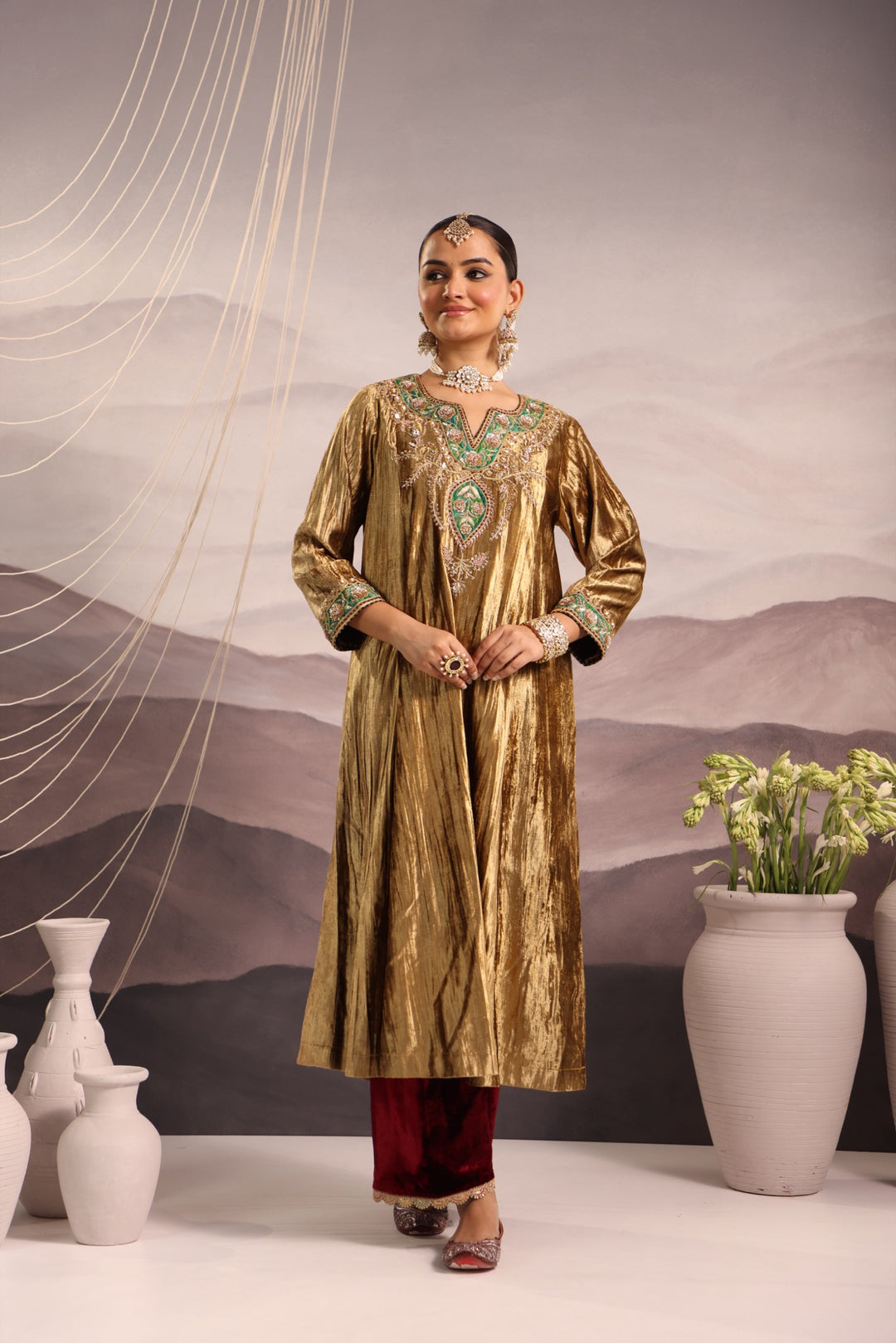 gold velvet kurta with green & maroon detailing and maroon velvet pant