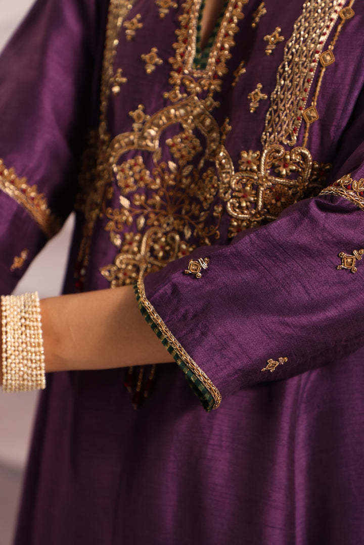 purple silk kurta set with hand embroidered yoke and beaded tassels