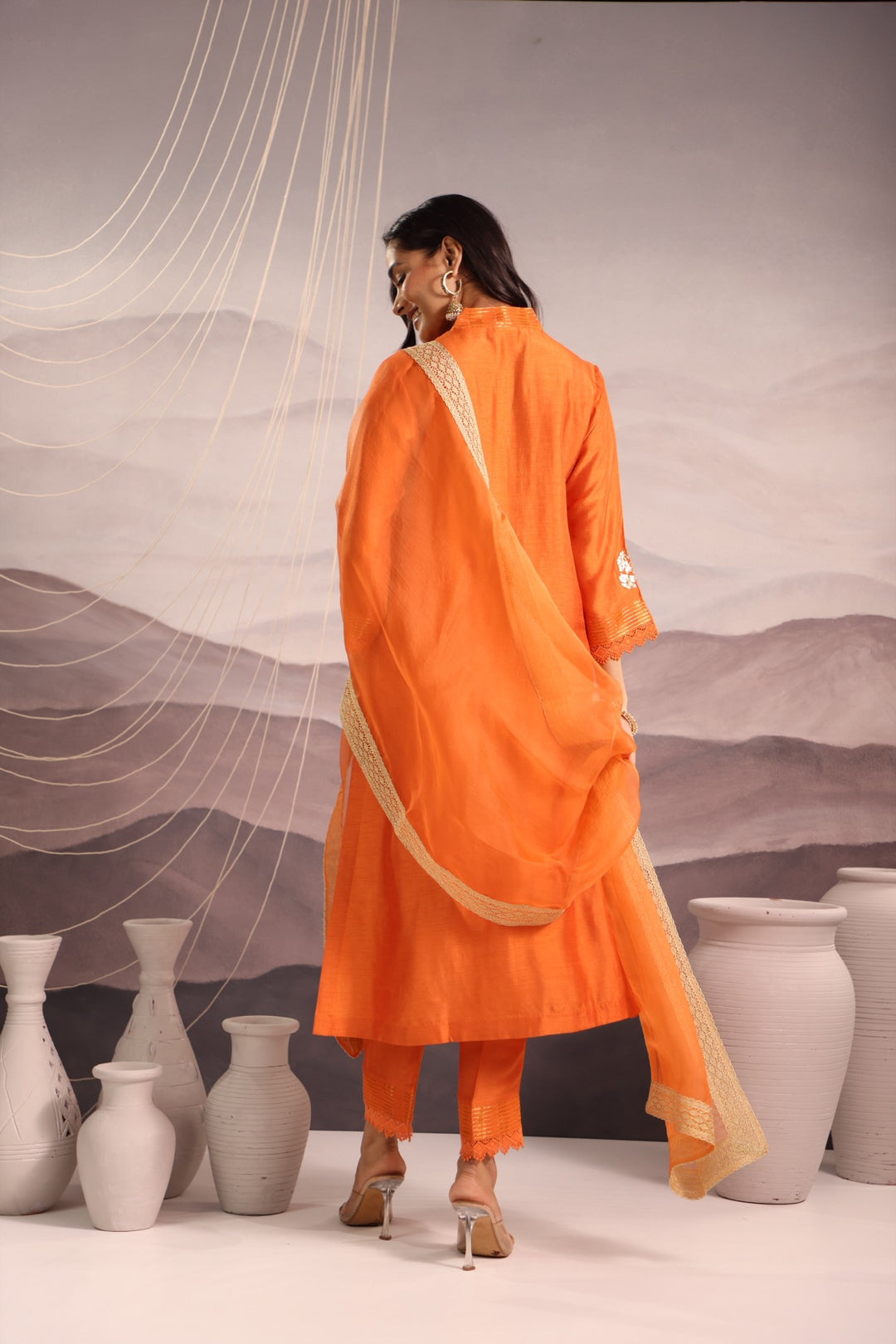 orange embroidered v neck silk kurta set