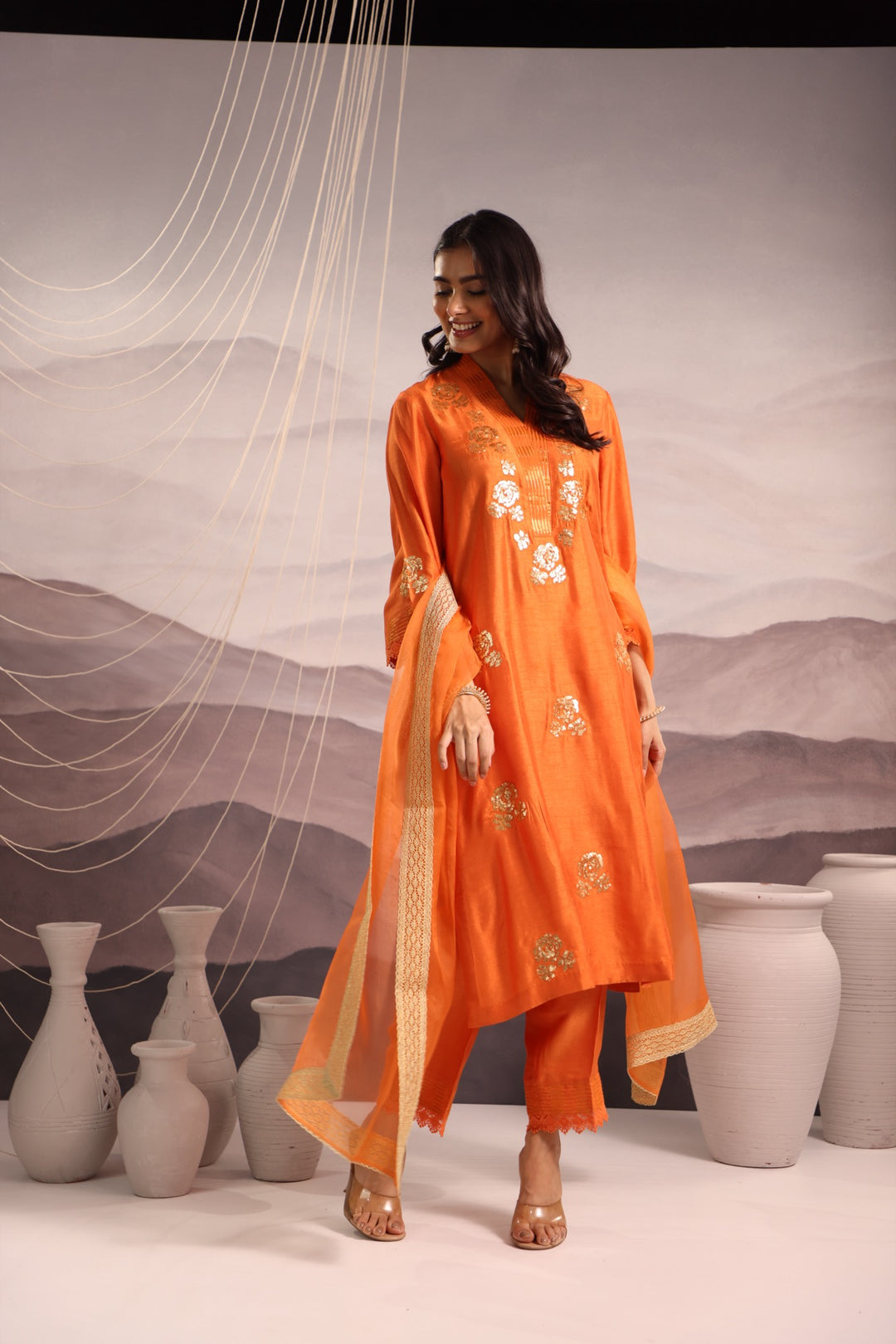 orange embroidered v neck silk kurta set