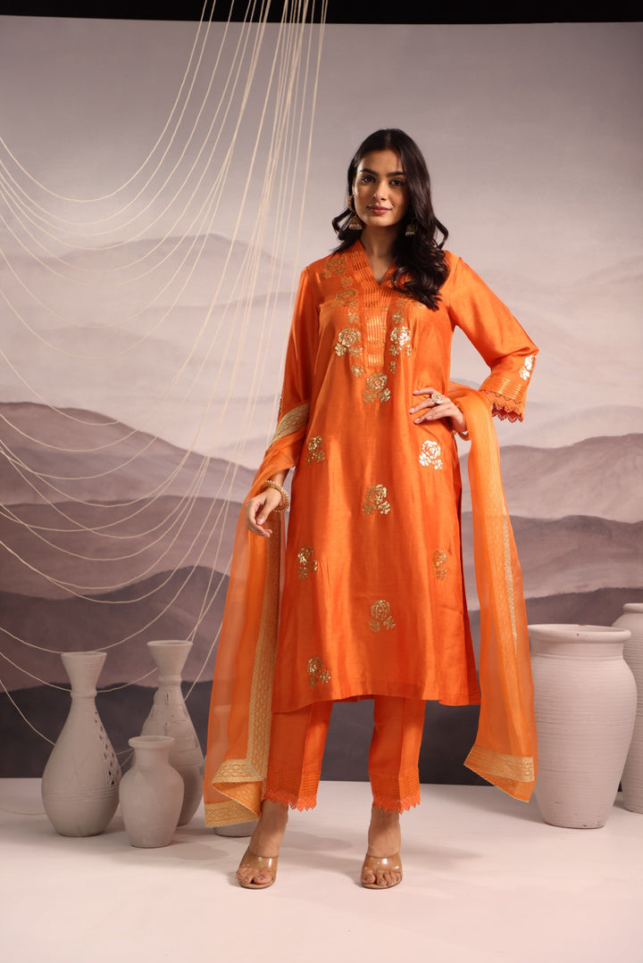 orange embroidered v neck silk kurta set