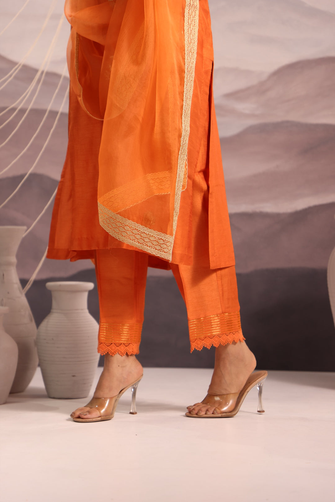 orange embroidered v neck silk kurta set