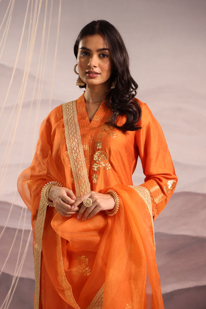 orange embroidered v neck silk kurta set