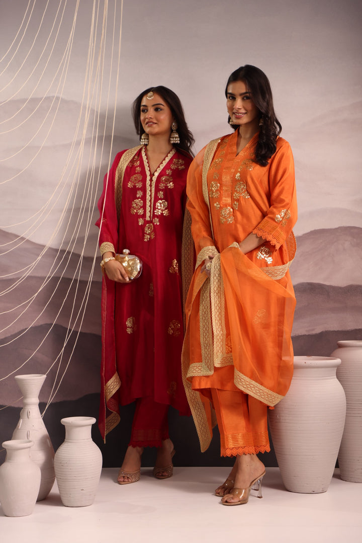 orange embroidered v neck silk kurta set