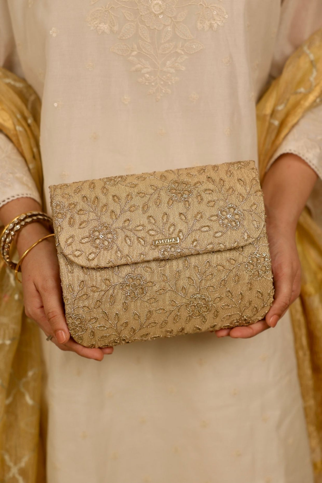 tarang flapover bag-gold