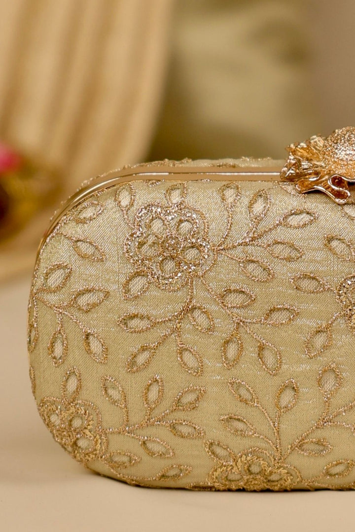 tarang cutwork capsule clutch-light gold