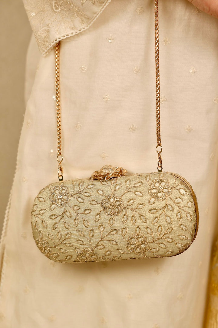 tarang cutwork capsule clutch-light gold
