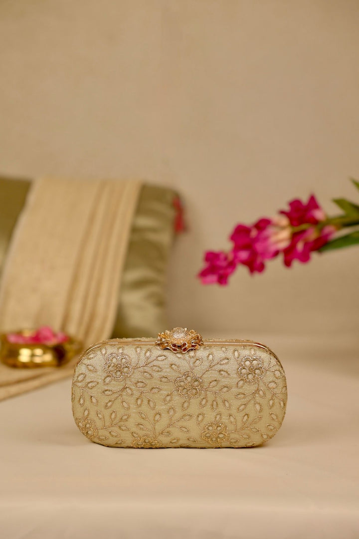tarang cutwork capsule clutch-light gold