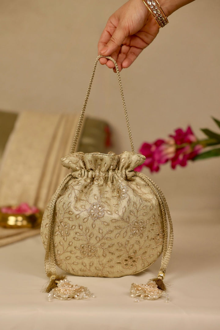 tarang cutwork potli-light gold