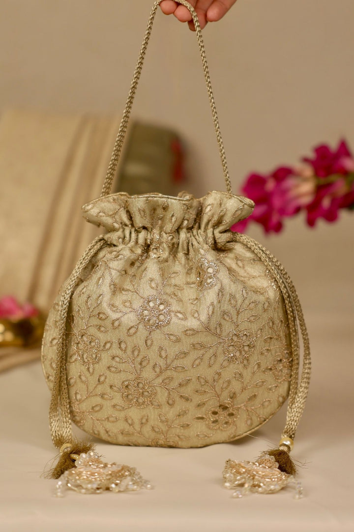 tarang cutwork potli-light gold
