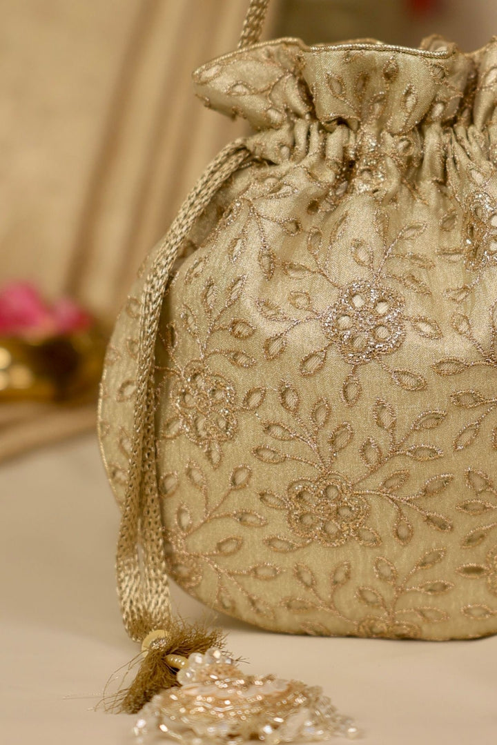 tarang cutwork potli-light gold