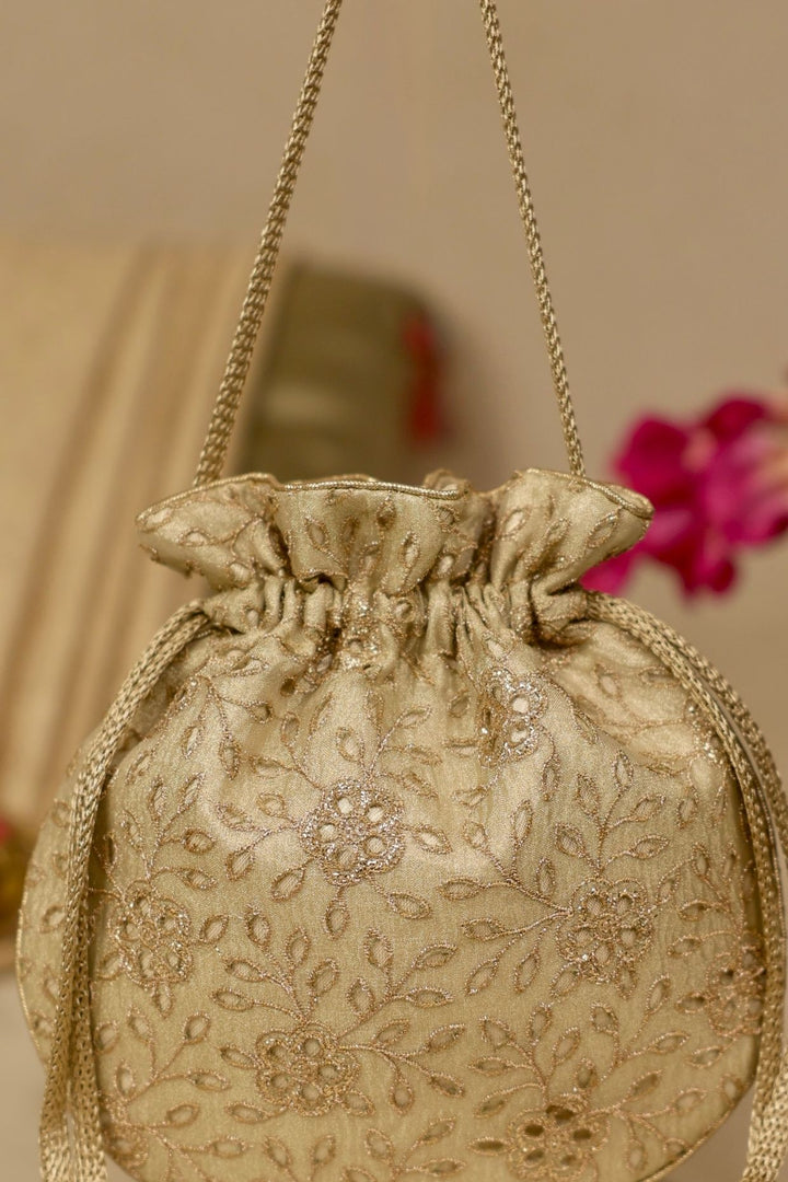 tarang cutwork potli-light gold