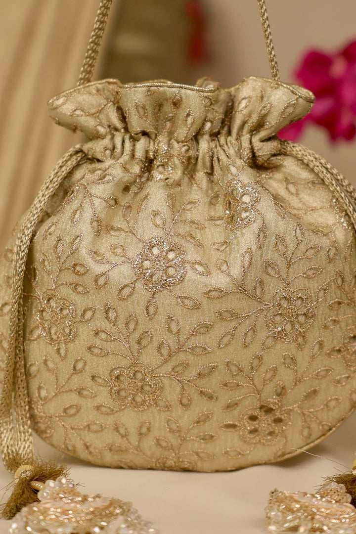 tarang cutwork potli-light gold