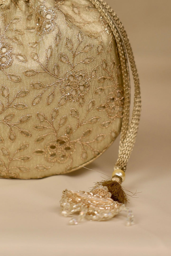 tarang cutwork potli-light gold