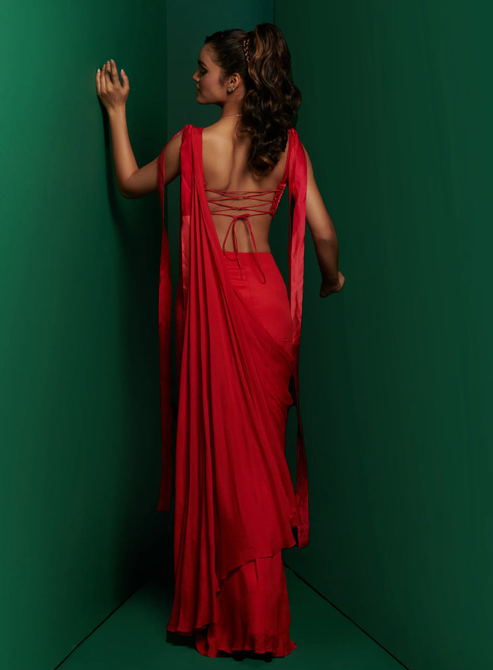 Crimson red cut out corset with drape saree