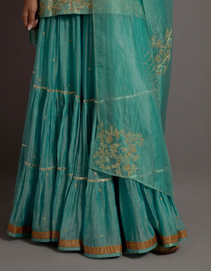 powder blue tissue short kurta skirt set