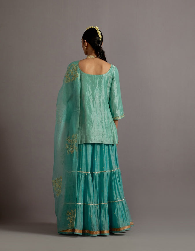 powder blue tissue short kurta skirt set