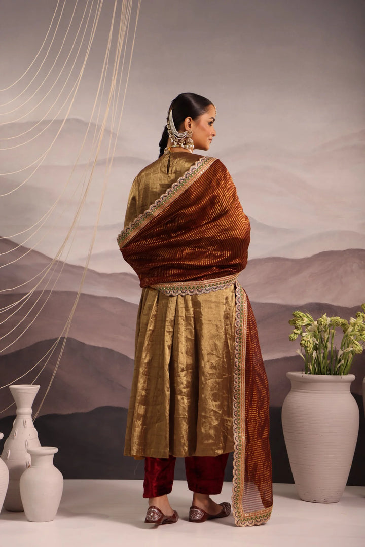 Gold Tissue Kalidar with Antique Look Yoke & Maroon Velvet Salwar