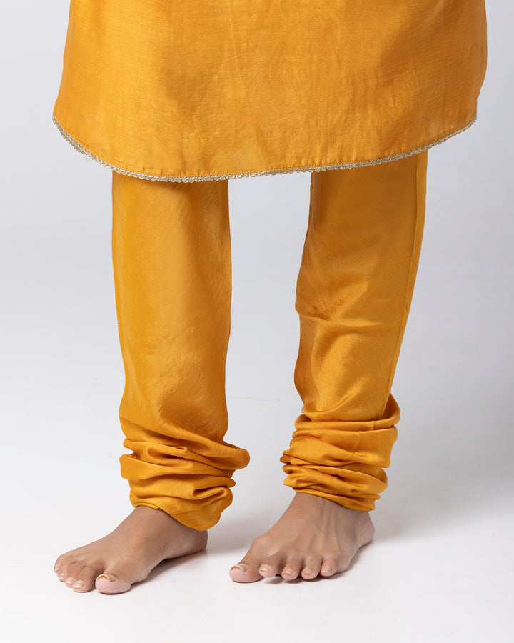 mustard silk chanderi embroidered angrakha kurta with churidar and green tissue zari dupatta