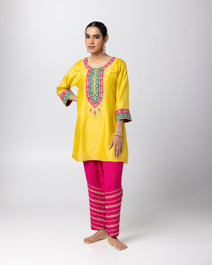 bright yellow silk chanderi short kurta with cotton silk pant and chanderi mull dupatta