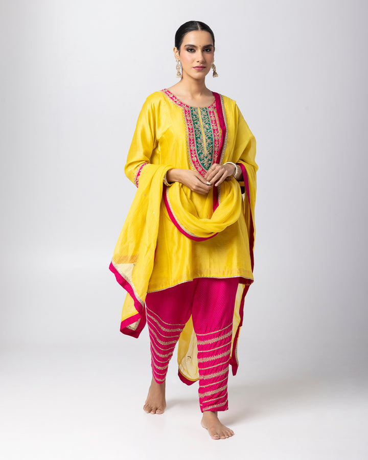 bright yellow silk chanderi short kurta with cotton silk pant and chanderi mull dupatta
