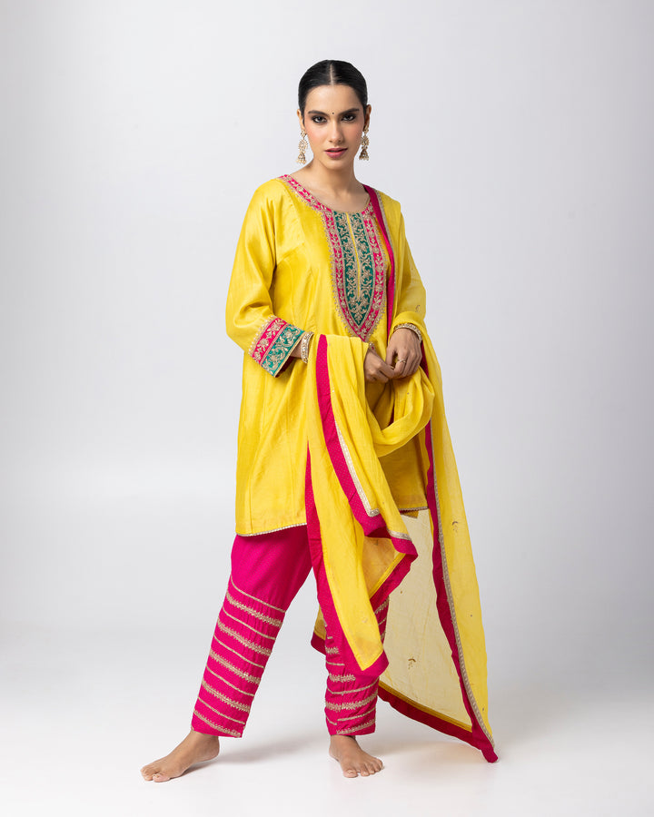 bright yellow silk chanderi short kurta with cotton silk pant and chanderi mull dupatta