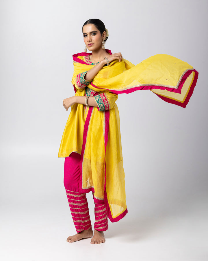 bright yellow silk chanderi short kurta with cotton silk pant and chanderi mull dupatta