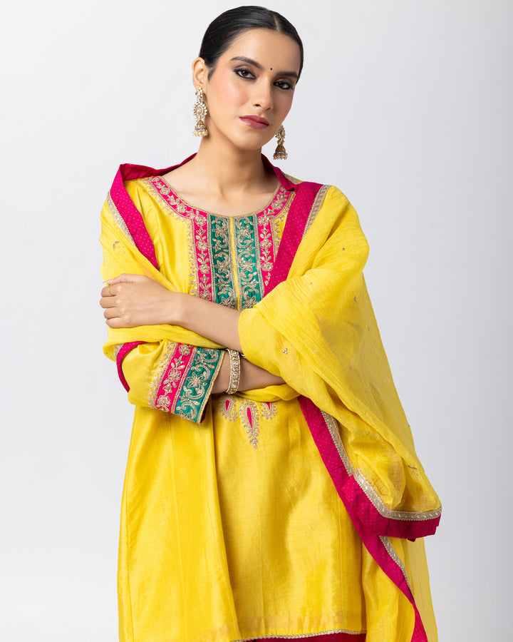 bright yellow silk chanderi short kurta with cotton silk pant and chanderi mull dupatta