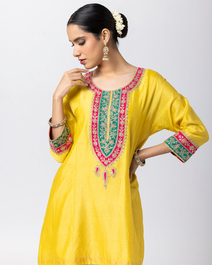 bright yellow silk chanderi short kurta with cotton silk pant and chanderi mull dupatta