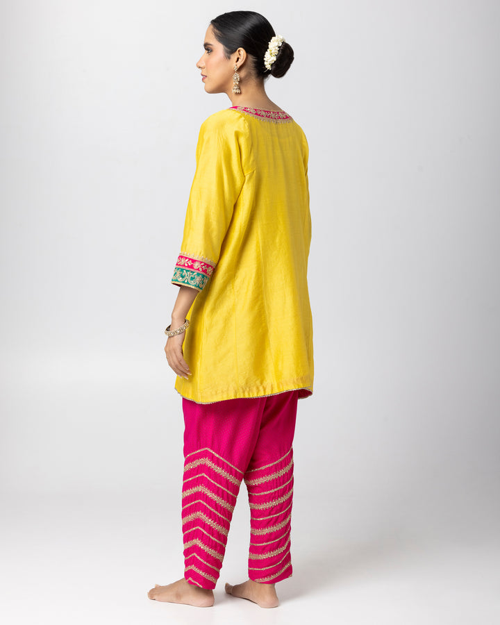 bright yellow silk chanderi short kurta with cotton silk pant and chanderi mull dupatta