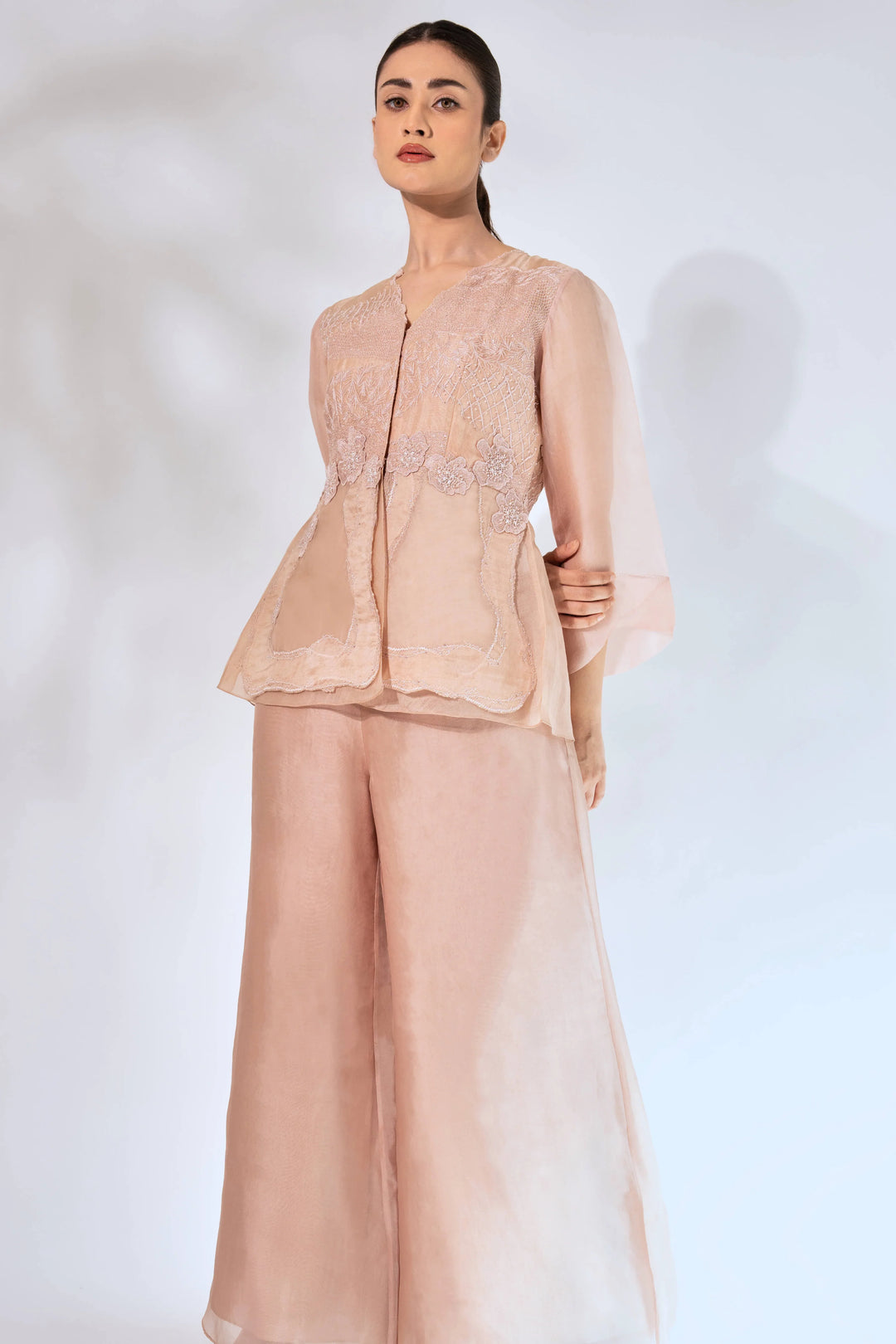 Peach Wave Peplum Top