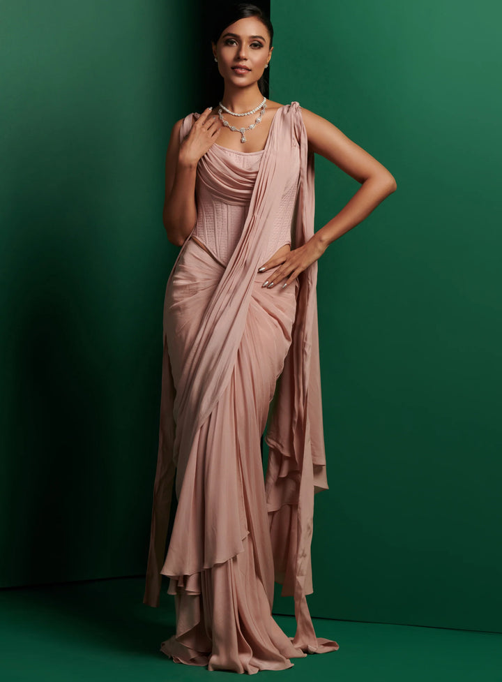 Pastel Pink Cowl Neck Corset With Drape Saree And Embellished Cape